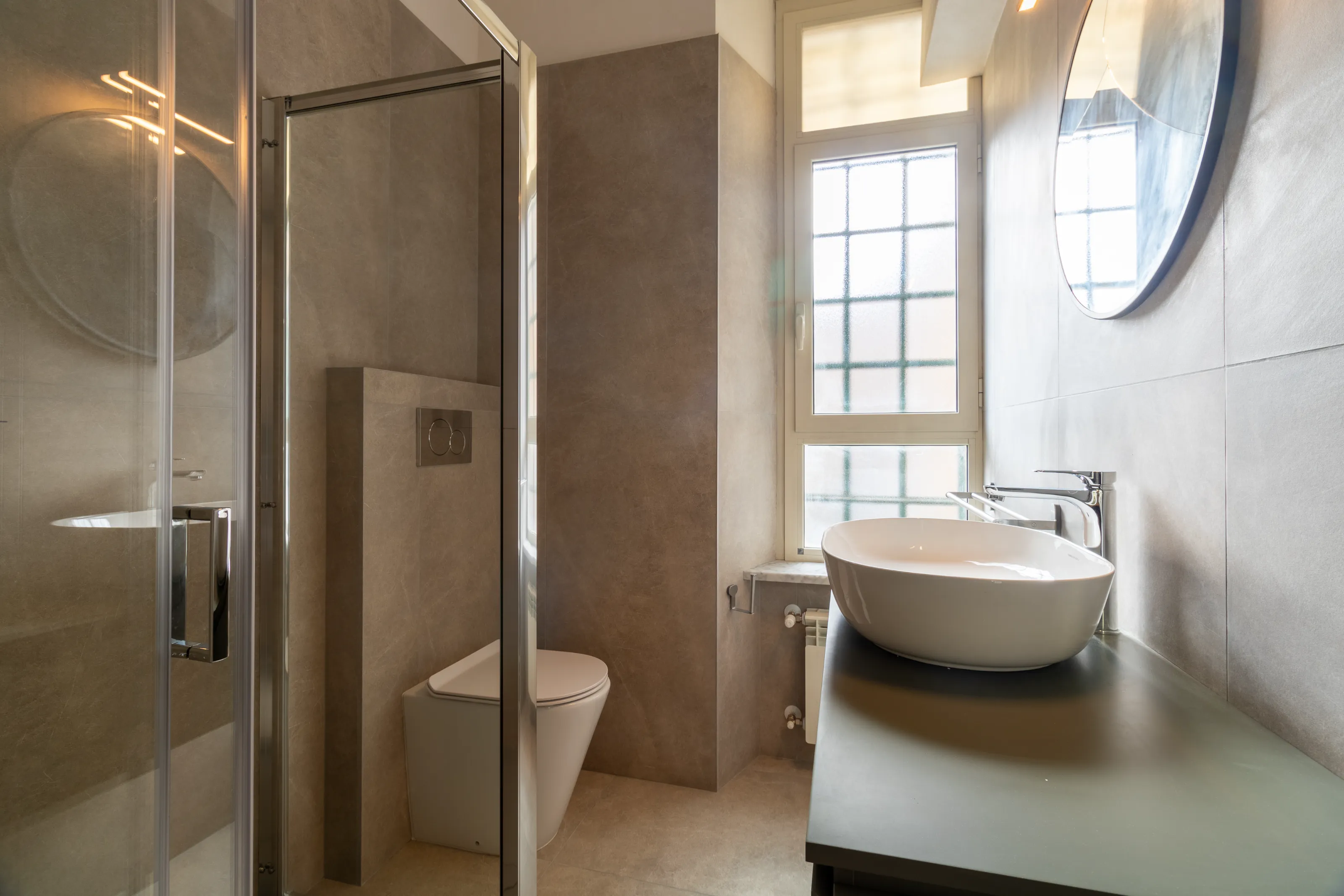 Bathroom with modern sink and large mirror